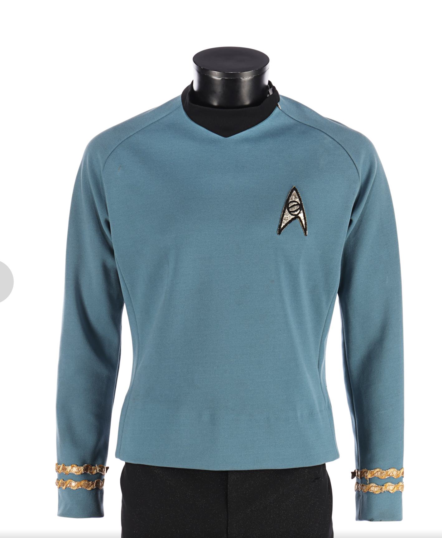 Close up of the blue tunic. 