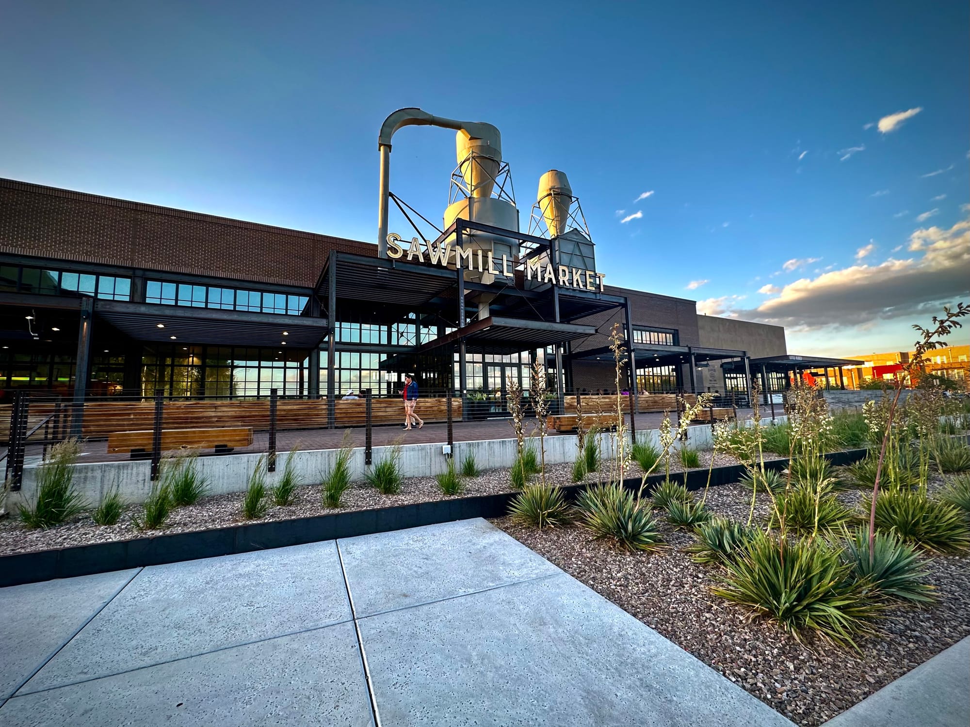 A photo of the front of the Sawmill Market building
