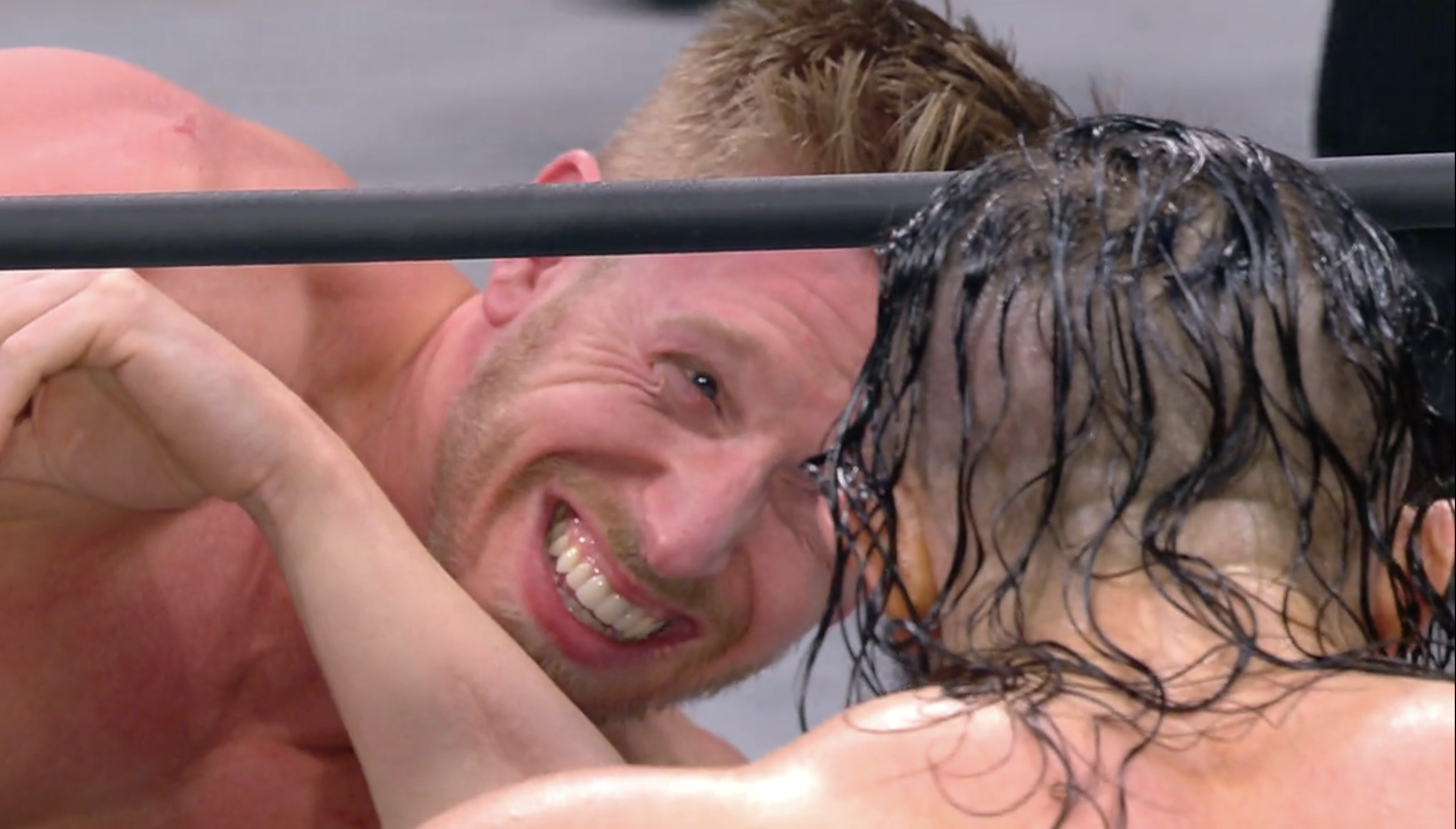 Orange Cassidy laughing at PAC