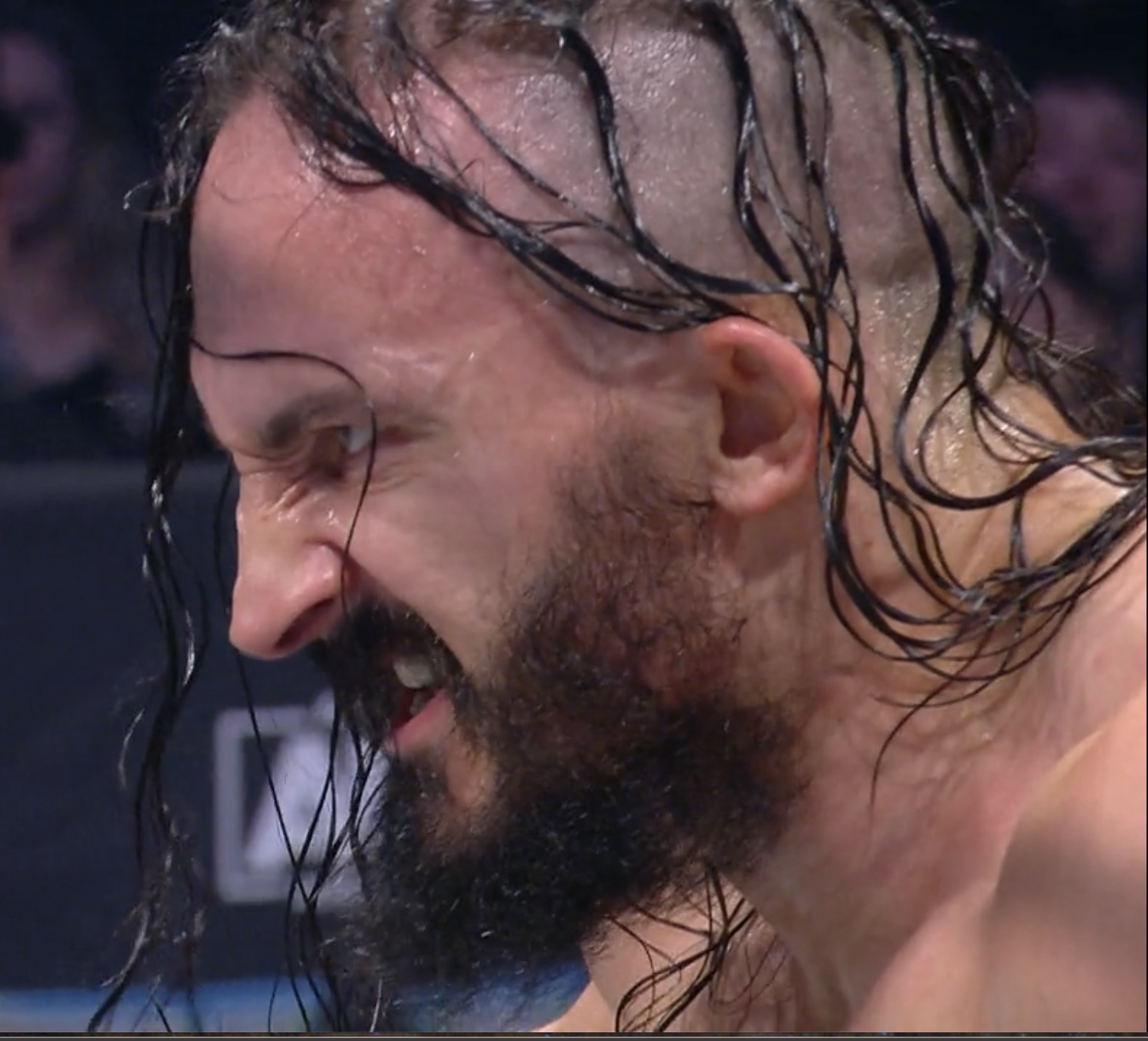 PAC scowling at Orange Cassidy