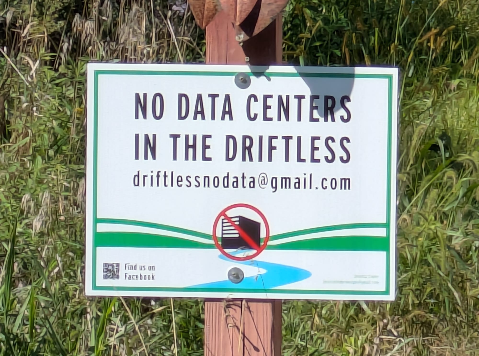 Sign reading NO DATA CENTERS IN THE DRIFTLESS