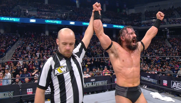 PAC has his hand raised by Bryce Remsburg at AEW Revolution 2020