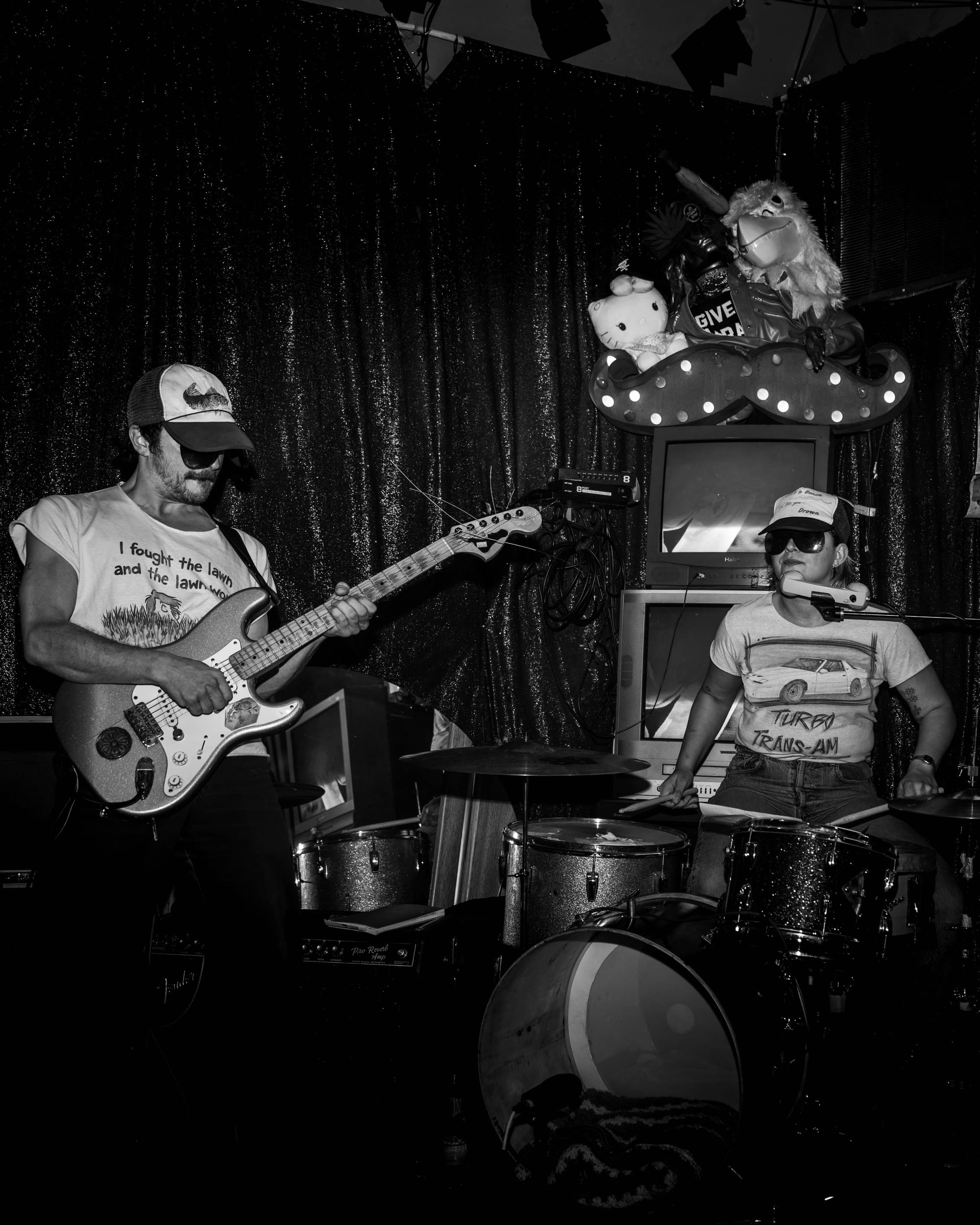 T.A.C.K. performing at Chicago’s Mustache Cafe in 2025, photo by Jason Peterson