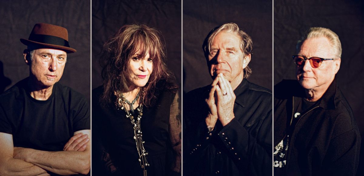 X, the band, sit for portraits