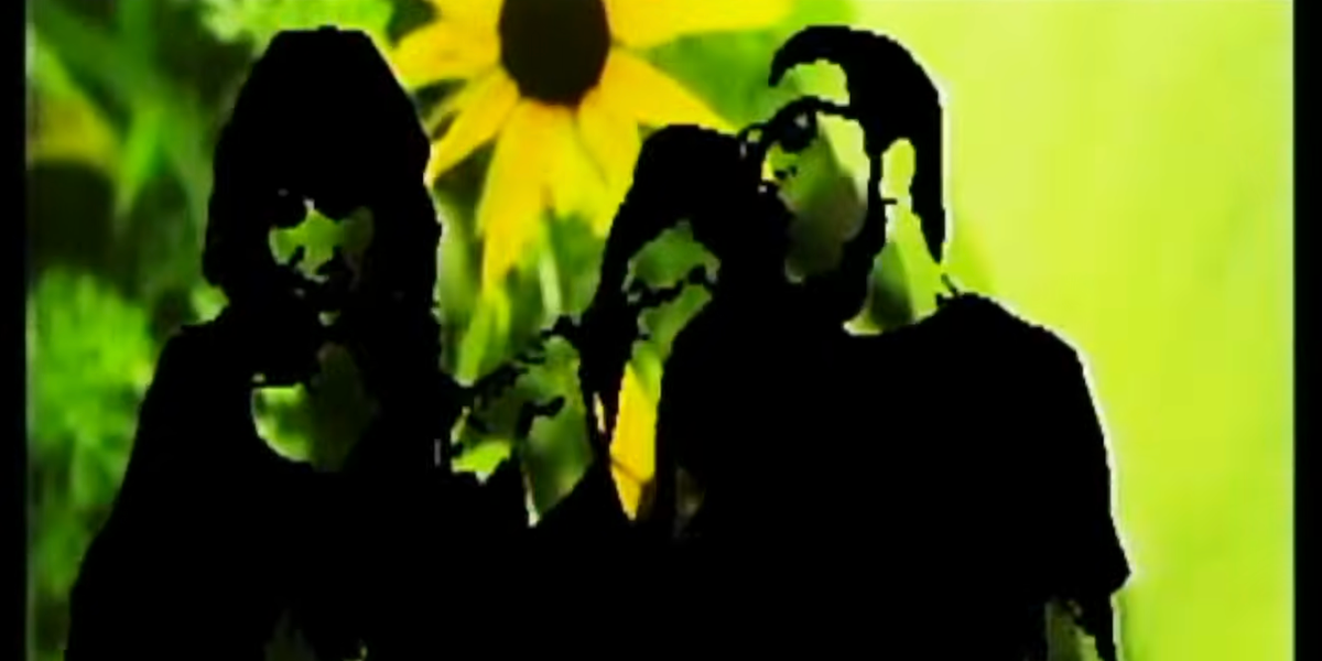 Selfish Teammate’s Allie Chinone and Lou Shemroske in the video for “Field of Flowers,” dir. Sandy Uhrich