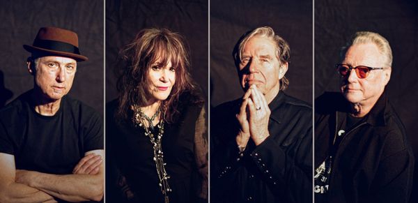 X, the band, sit for portraits