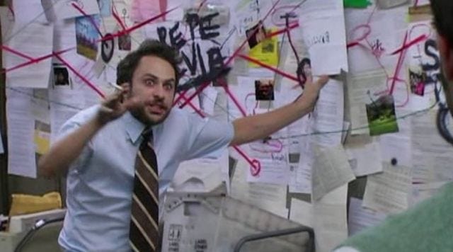 A crazy man in front of disparate information, crazily attempting to piece things together