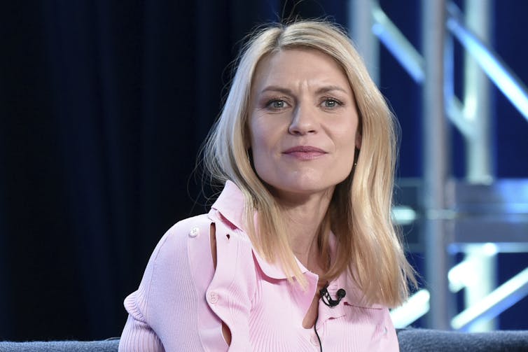 woman in pink jacket