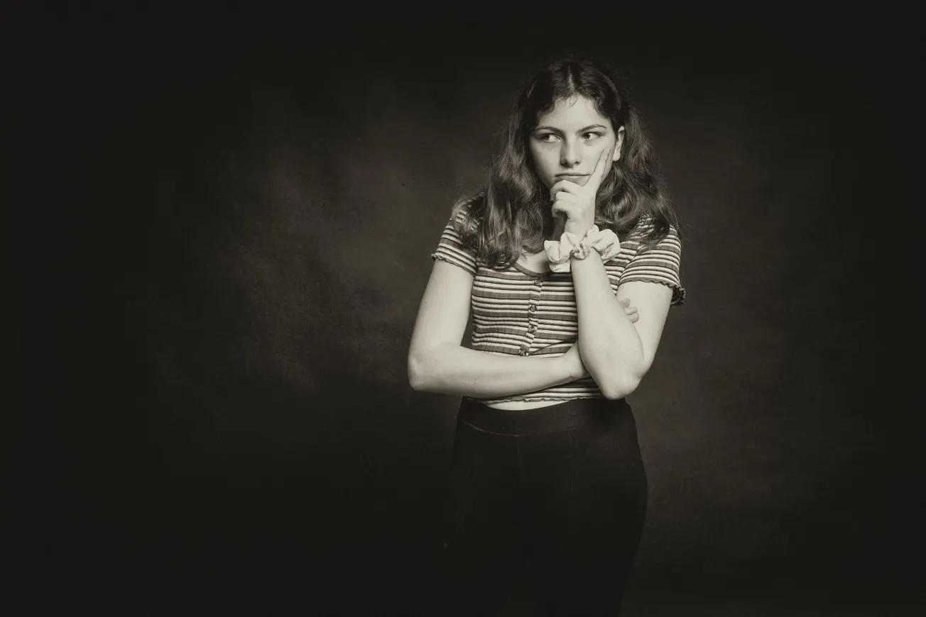 woman in black tank top and black pants