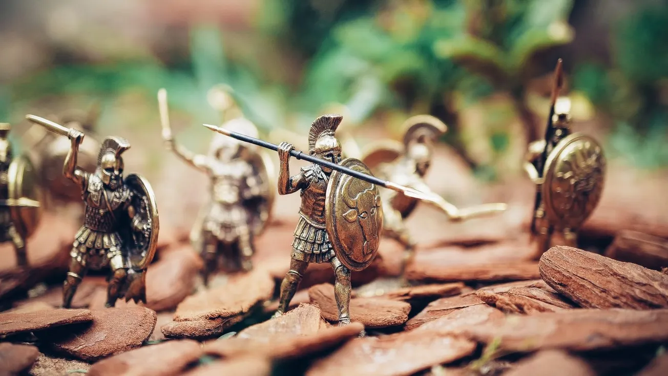 grey metal knights figurines during daytime