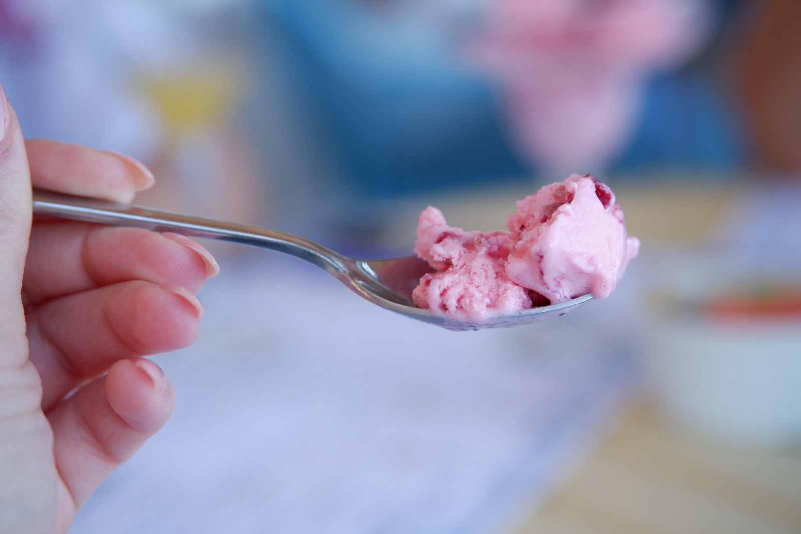 pink ice cream in clear glass cup