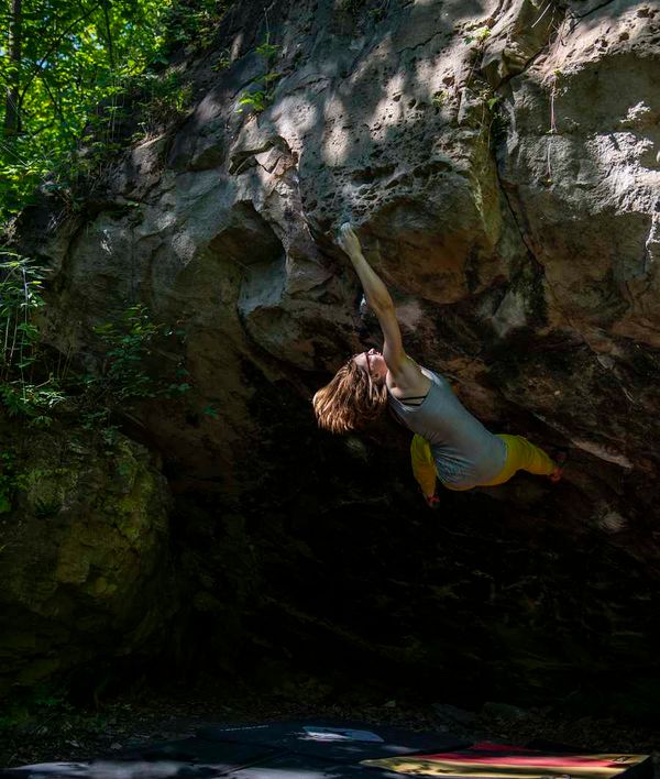 A climber bouldering at the Niagara Glen