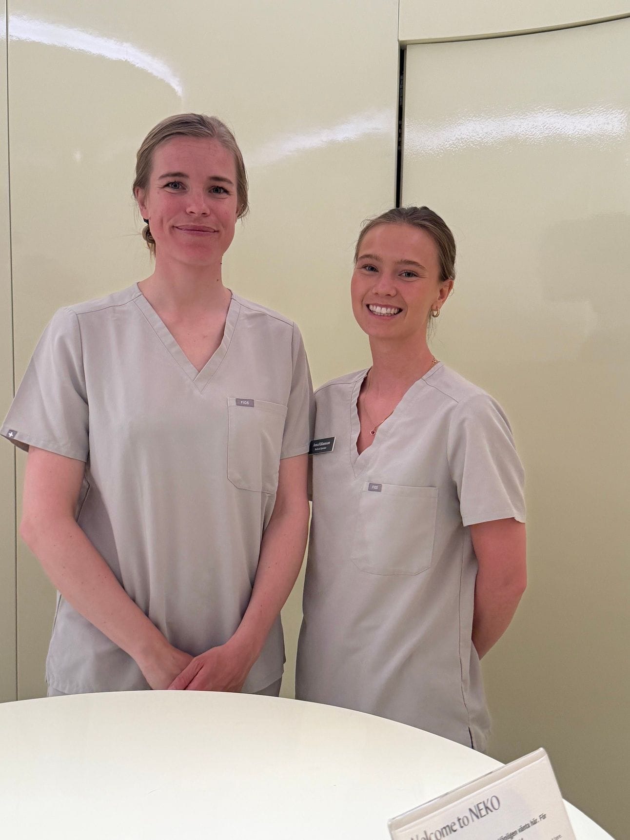 Two smiling nurses from Neko