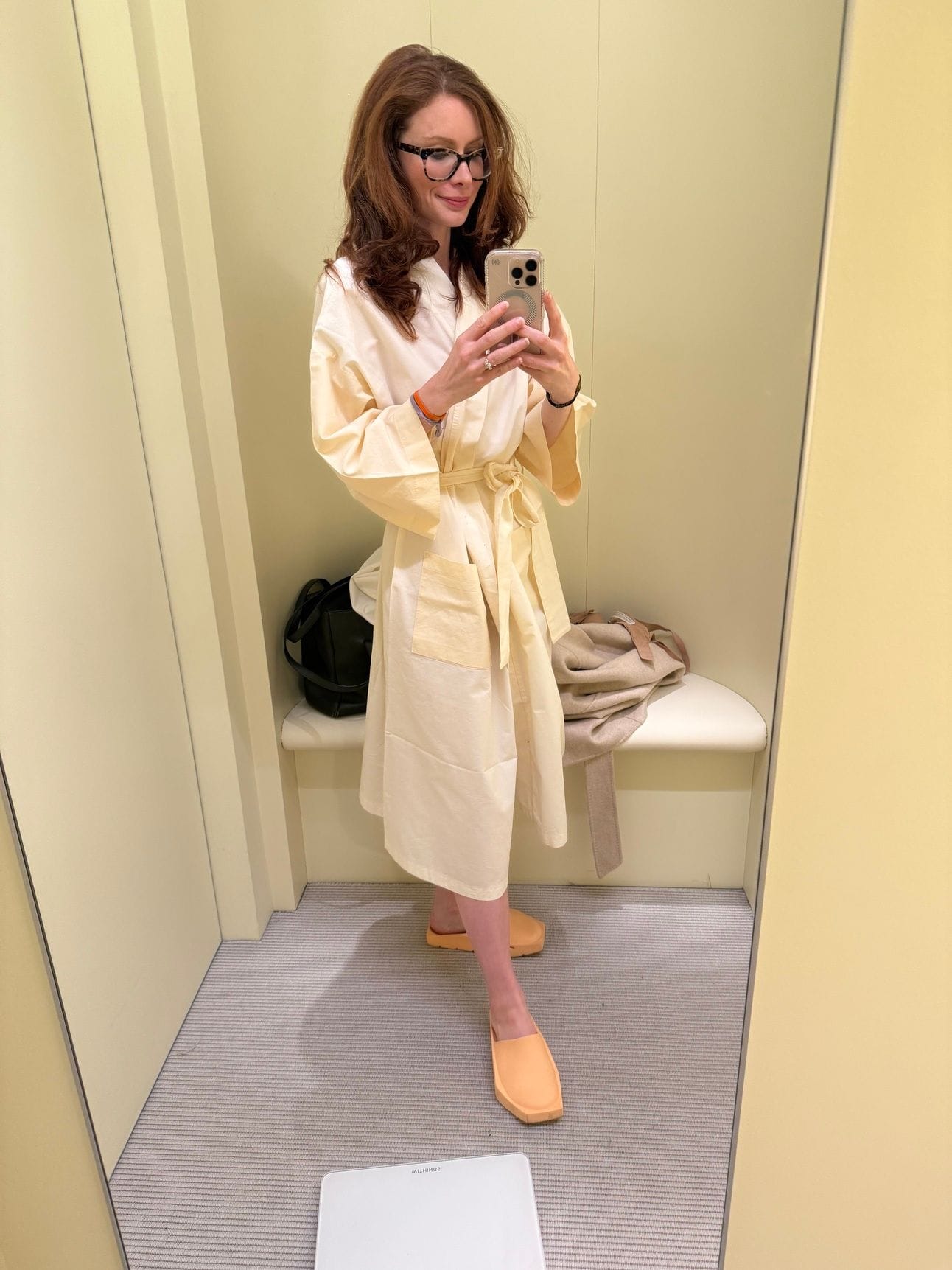 Person in robe waiting