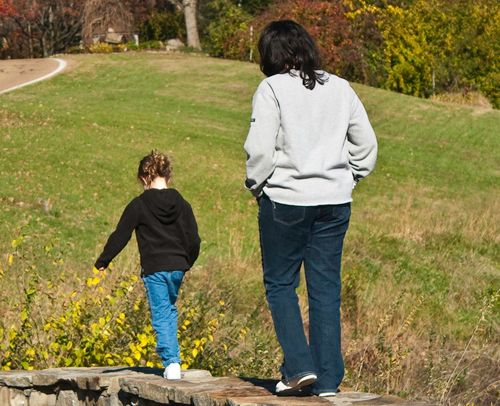 mom and girl walking