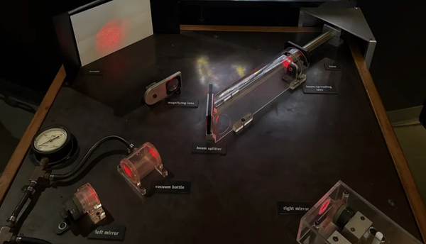 The Tabletop That Hears Black Holes