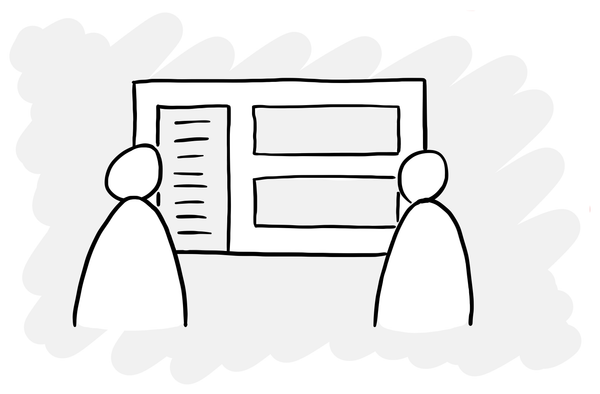 Two people looking at a design