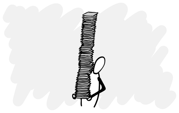 A person carrying a huge stack of paper