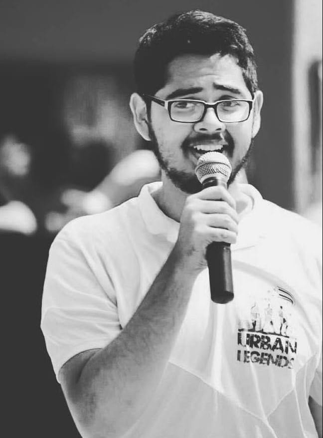 Nuski speaking at an event