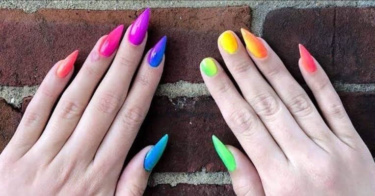 Picture of manicured nails with 2 nails shorter