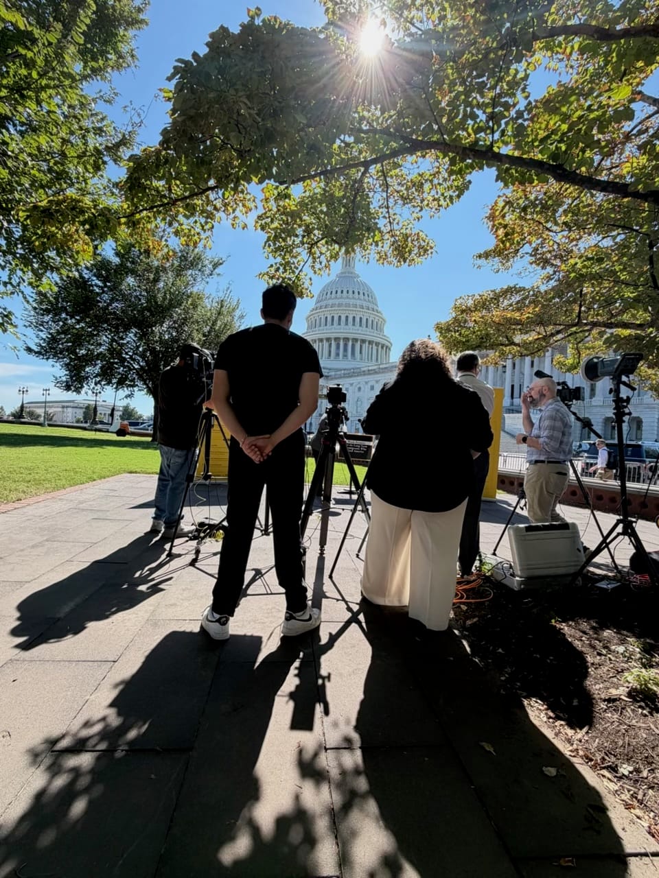 Chef Raba shot from behind, in front of the Capitol building