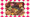 A large sheet tray holds various barbecued meats, sides, a burger, and sauces.