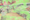 A photo of a produce section at a grocery store with splotches of green over.