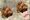 Sausage rolls from the Ginger Pig hovering over an antique map of the city of London