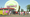 A line of people waiting at an ice cream stand called Cindy's Drive In.