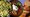 overlapping bowls of pasta, chili and a plate of banana bread