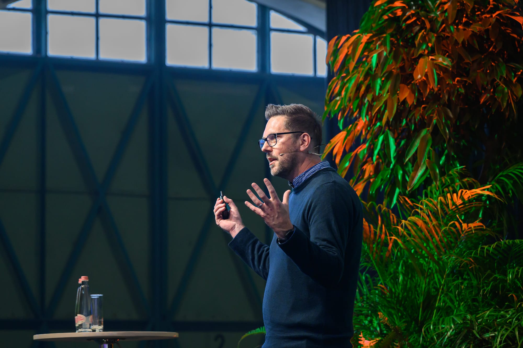 A photo of Rob Lambert on stage