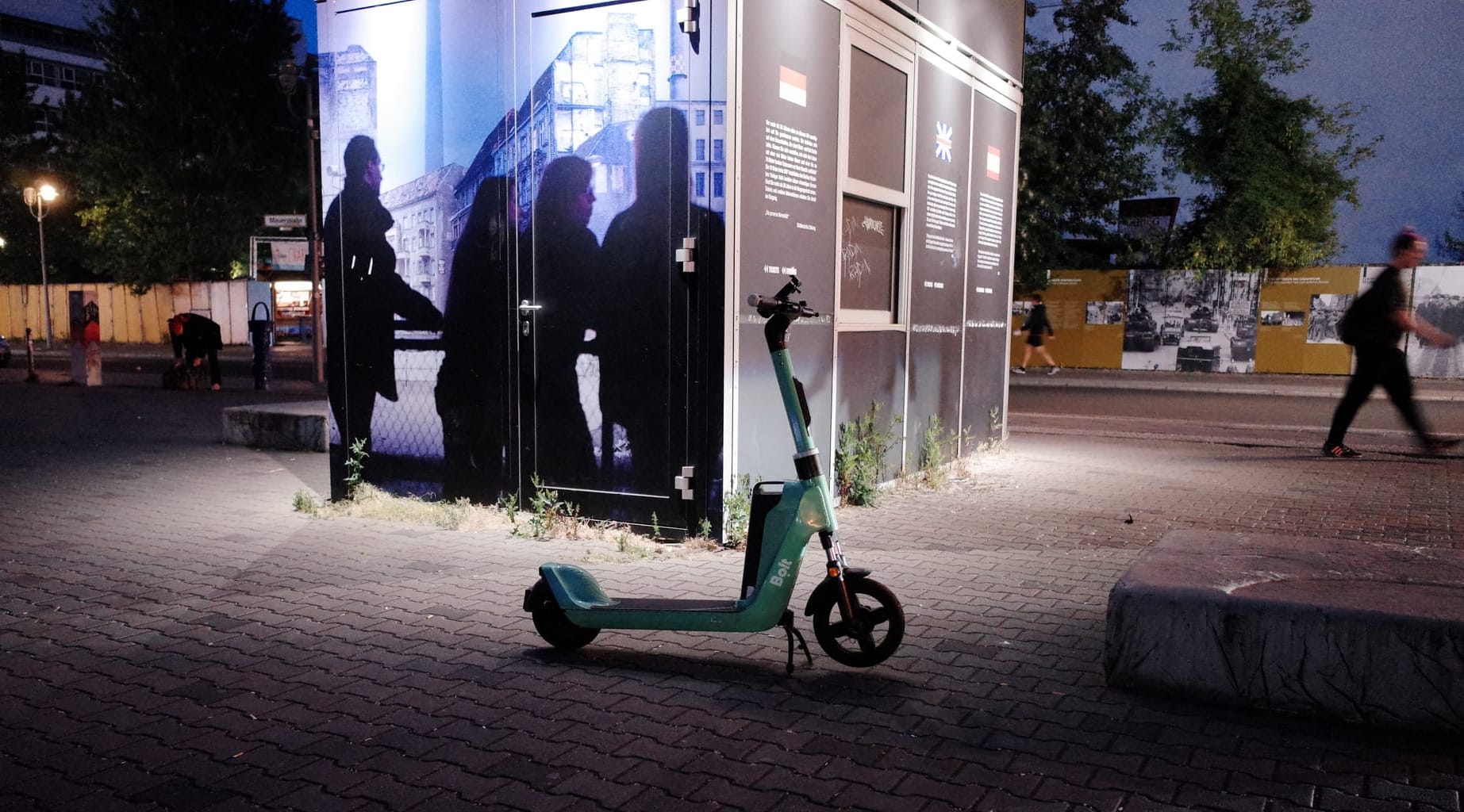 A scooter, waiting for the next customer - Checkpoint Charlie, Berlin
