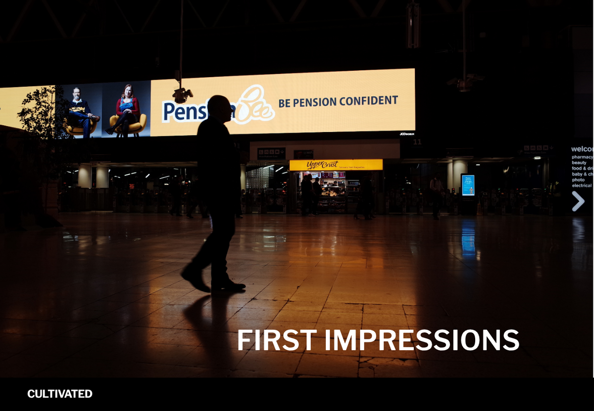 A photo of a man in Waterloo station in London with the words overlaid - first impressions