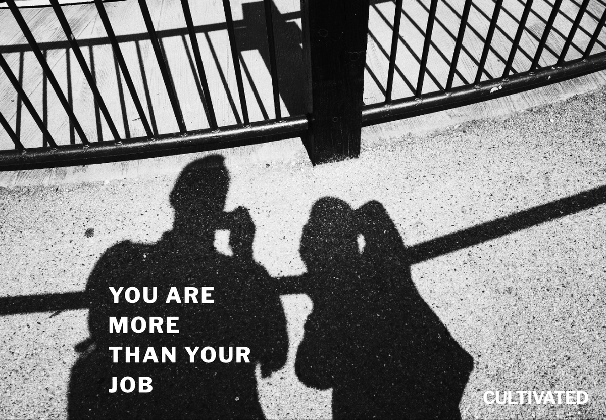 A photo of two shadows on the floor with the words "you are more than your job" overlaid