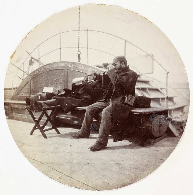 A man on the deck of a boat