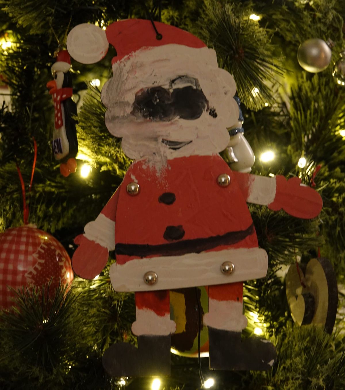 A photo of a Father Christmas ornament my son made