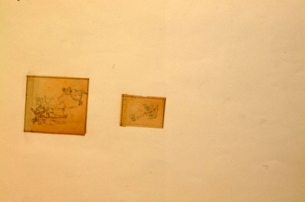 A photo of sketches and ideas on a wall