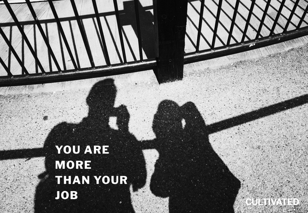 A photo of two shadows on the floor with the words "you are more than your job" overlaid