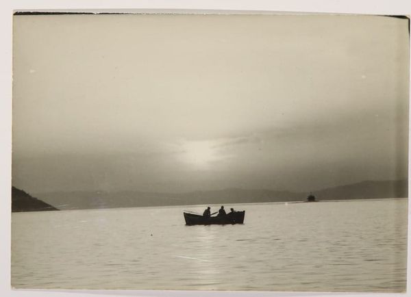 An old photo of people fishing in Greece.
