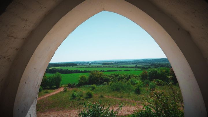 A photo through the arches at Farley Mount, Winchester, Hampshire
