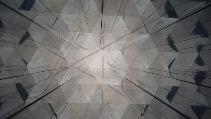 A photo of a reflection on reflection on reflection 