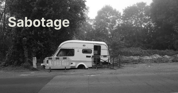 A photo of a derelict caravan with the words overlaid - Sabotage