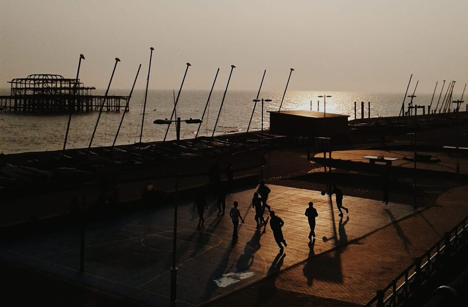 A photo of people playing Basketball on Brighton Beach