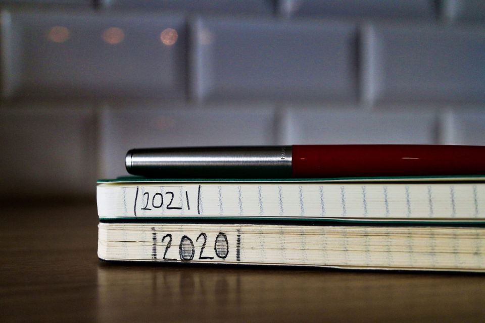 A photo of journals and notebooks