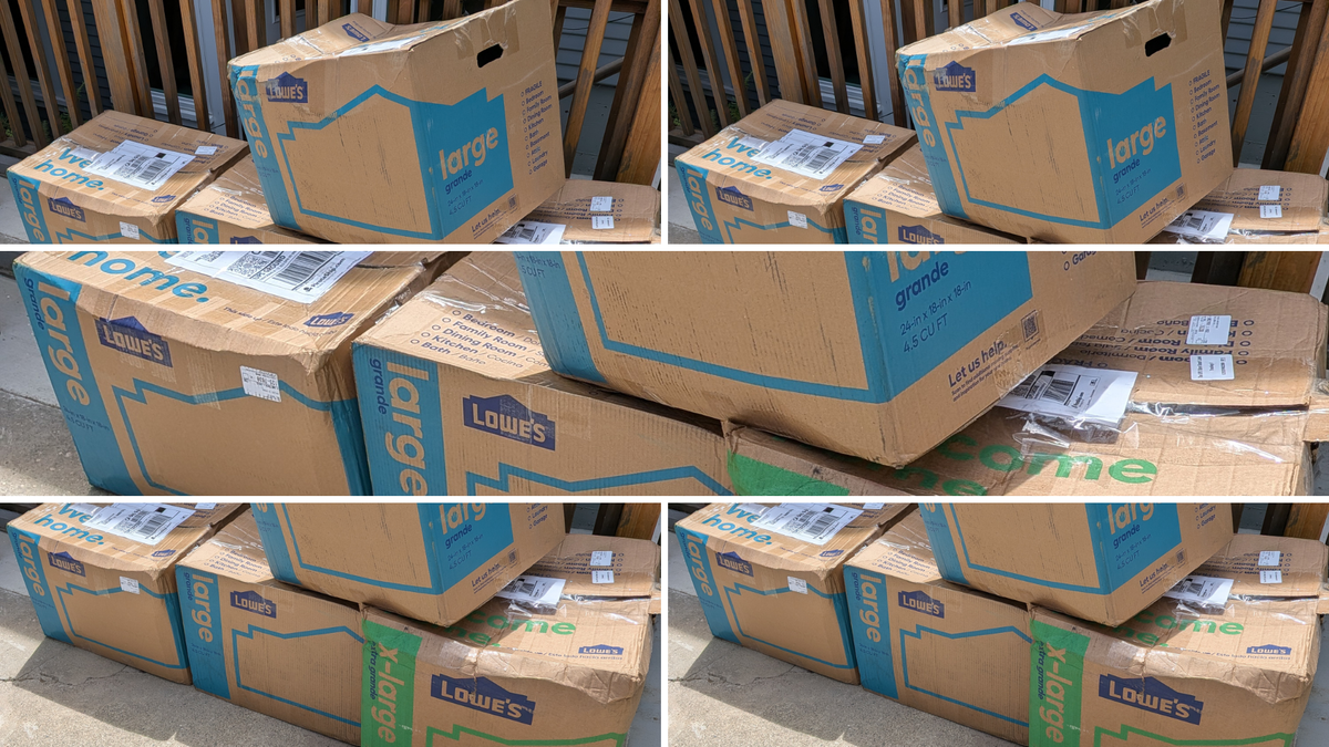 Moving boxes, slightly damaged, and waiting to be unpacked.