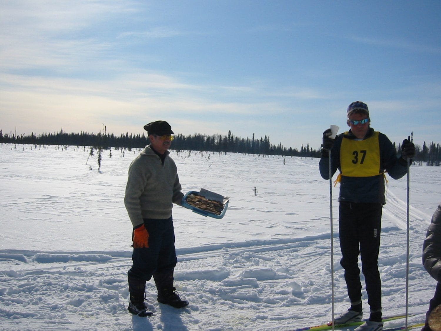 Rich Crain hands out hot treats to skiers
