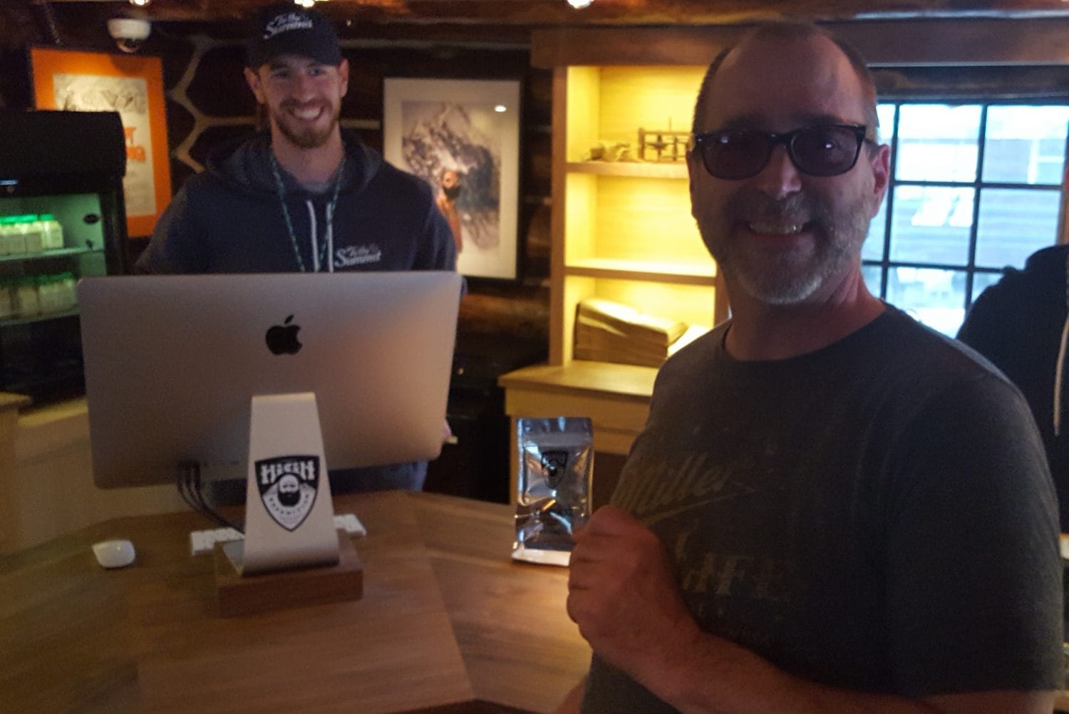 "Mark of the Wild" (front) and Joe McAneney moments after completing the first legal retail sale of cannabis in Talkeetna. Photo: Phillip Manning - KTNA