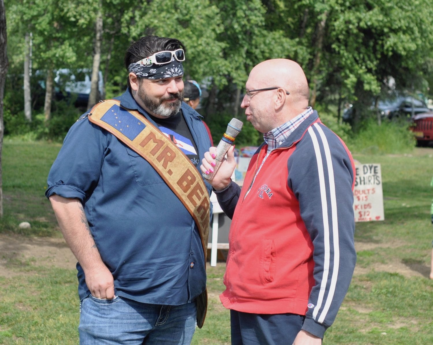 RJ Johnson (L) speaks to Daphne Doall LaChores (R) about coming home to Talkeetna for Pride.