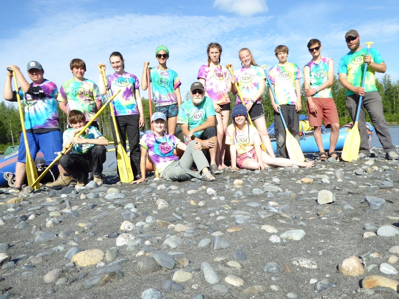 Participants in NSI's 2017 youth rafting trip with co-instructor Joe Page (center) Photo courtesy of Tia Shoemaker