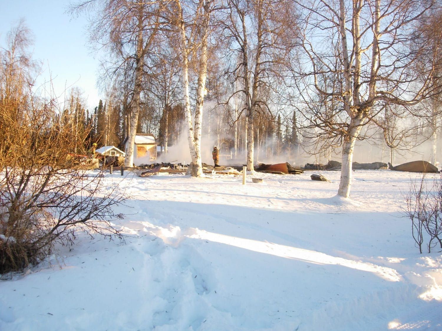 Woman killed in home fire near Caswell Lakes